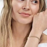 14k Yellow Gold San Marco Chain Bracelet on woman's wrist